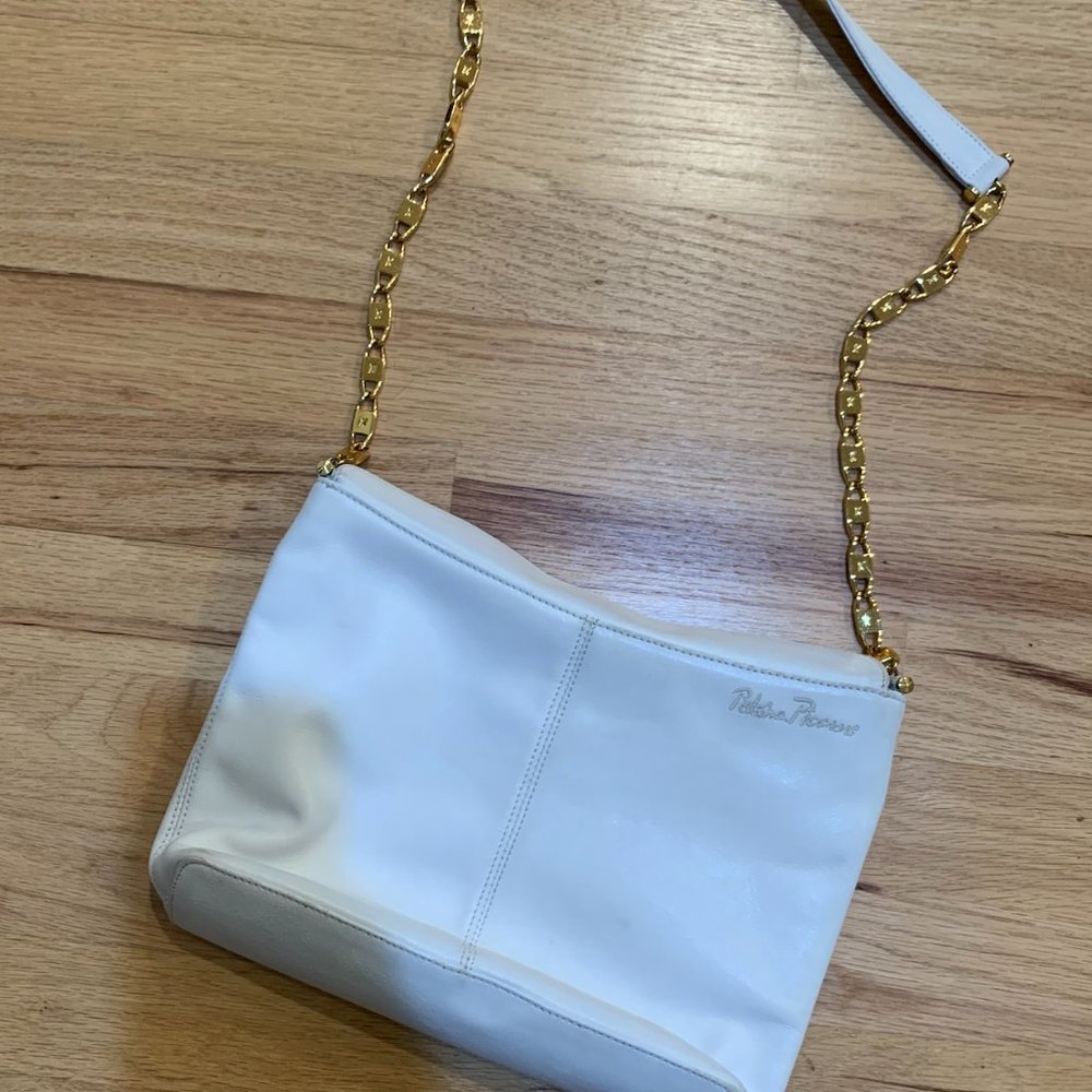 Paloma Picasso white purse with gold accent